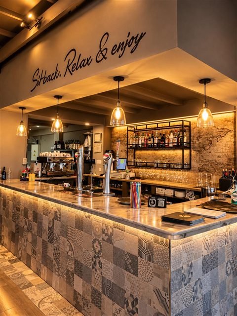 A warm welcome at the bar
